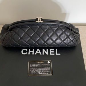 Beautiful Authentic Chanel Lambskin clutch.